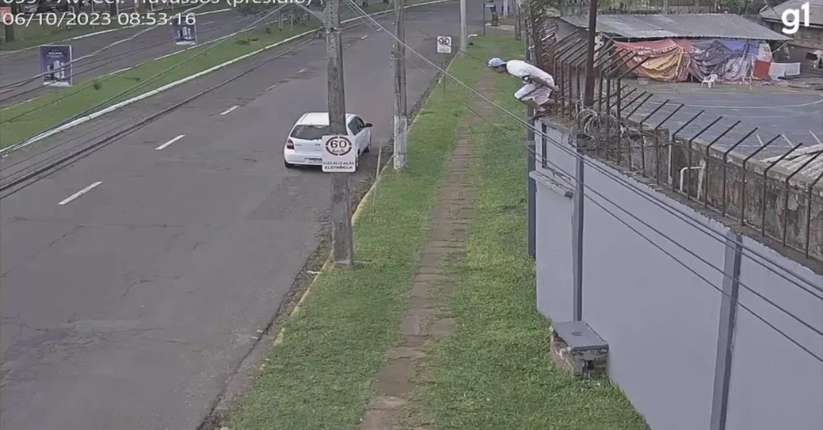 em plena luz do dia, preso pula muro e foge da cadeia no Sul 31 FN+