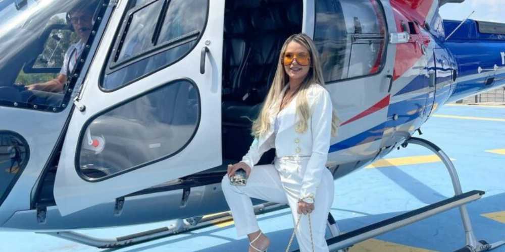 Antes de prisão, Deolane disse na web: Dinheiro não traz felicidade 37 deolane ao lado de helicoptero.jpg