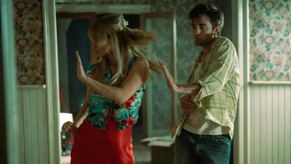 confira 1a cena entre Robert Pattinson e Jennifer Lawrence.webp