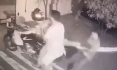homem e espancado por torcedores rivais na frente do filho.webp
